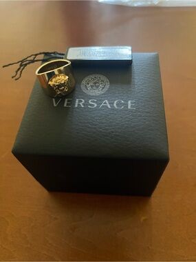 Authentic Versace size 7, Gold Medusa Accent Wide Band Ring
